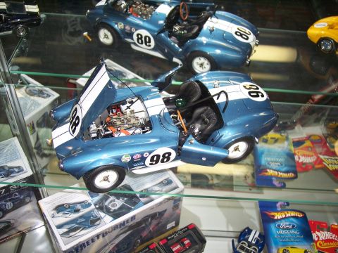 1972 Ford Ranchero - Model cars, possibly Shelby Cobras, displayed with racing numbers and open hoods.