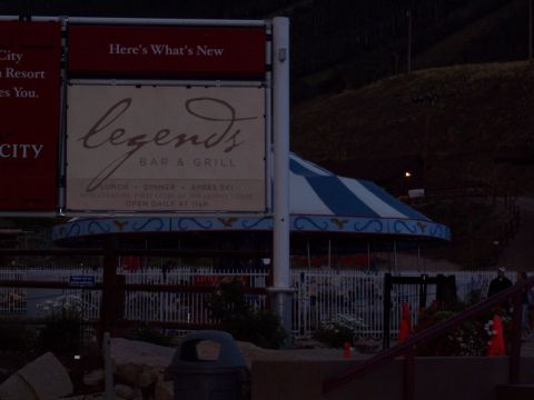 1972 Ford Ranchero - A sign for Legends Bar & Grill is visible in front of a carousel at dusk.