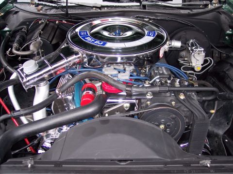 1972 Ford Ranchero - The engine bay of a 1972 Ford Ranchero features a prominent chrome air cleaner with "351 CJ" visible.