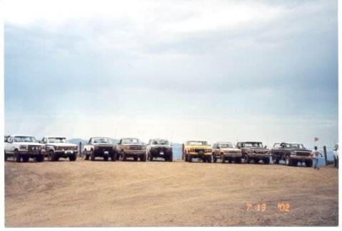 1989 Ford Bronco - Lots of trucks gathered at the parking area
