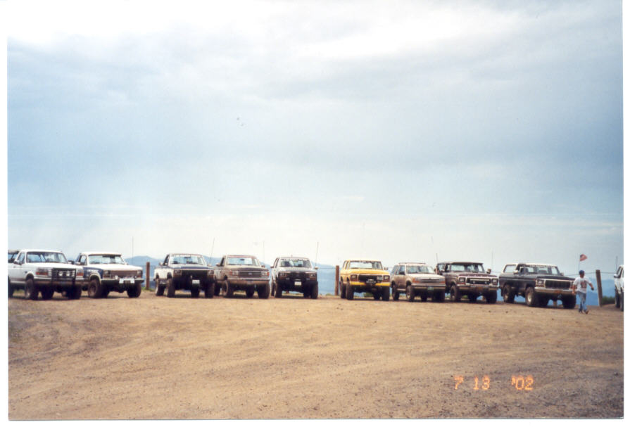 Lots of trucks gathered at the parking area