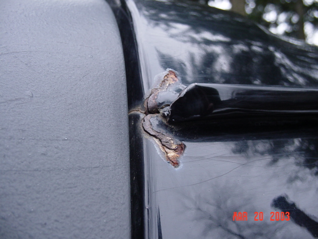 Rip in the rear of the rain gutter