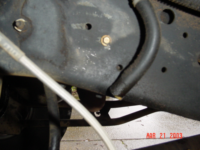 This id the hose that goes to the valve cover, notice I dump it at the frame ...See the yellow goo on the end of the hose