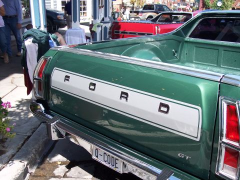 1972 Ford Ranchero - Rear view of a green 1972 Ford Ranchero pickup truck, the Ford badging and a GT emblem.