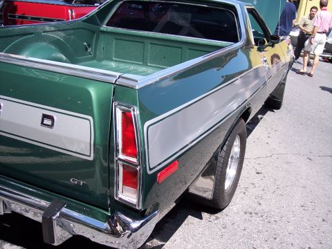1972 Ford Ranchero - Rear view of a green 1972 Ford Ranchero GT with a silver side stripe and GT badging.