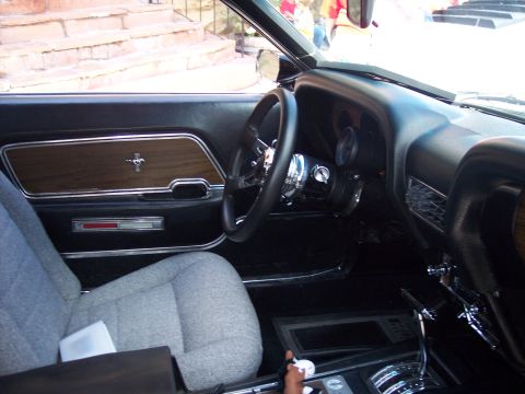 1972 Ford Ranchero - Interior view of a 1971 Ford Mustang, highlighting the door panel and dashboard details.