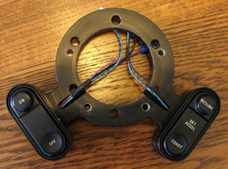 1984 Ford Bronco - Cruise control switches with ON, OFF, RESUME, SET ACCEL, and COAST labels are shown mounted to a steering wheel adapter.