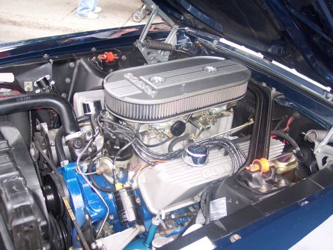 1972 Ford Ranchero - Close-up view of a V8 engine bay, an aftermarket air cleaner and valve covers.