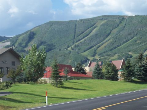 1972 Ford Ranchero - A scenic view of a mountain resort area with buildings and trees in the foreground.