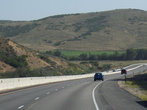 1972 Ford Ranchero - Driving on a highway through a rural landscape with rolling hills and green fields.