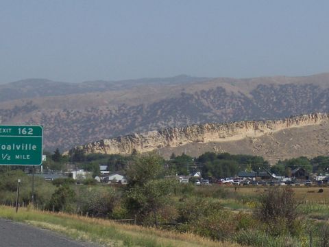 1972 Ford Ranchero - Highway sign indicates exit for Coalville, Utah, with a view of the town and surrounding mountains.