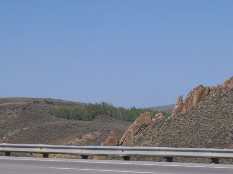 1972 Ford Ranchero - A scenic view of hills and rock formations along a highway.