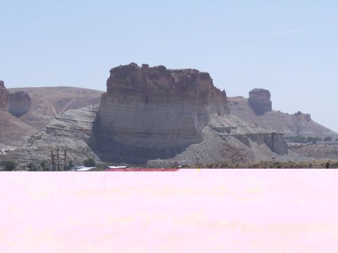 1972 Ford Ranchero - Expansive desert landscape prominent rock formations and geological strata.