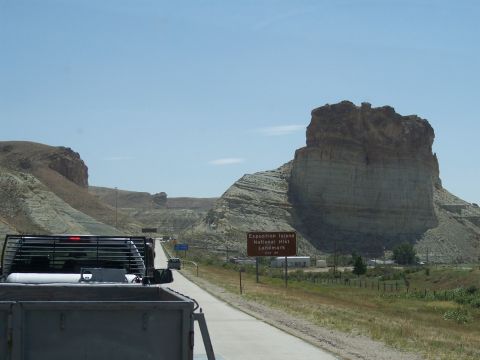 1972 Ford Ranchero - Driving towards the Expedition Island National Historic Landmark, with a truck in the foreground and other vehicles on the road.