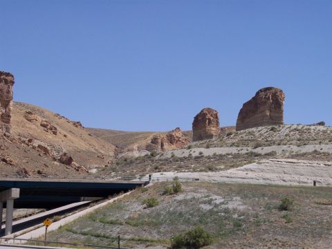 1972 Ford Ranchero - A scenic view of layered rock formations along a highway.