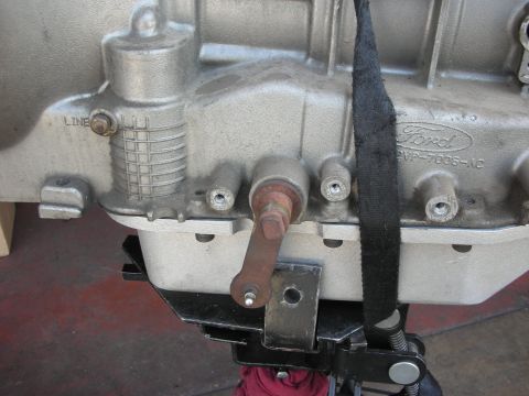 1992 Ford Crown Victoria - Close-up of a Ford transmission part, showing the "LINE" marking and a part number.