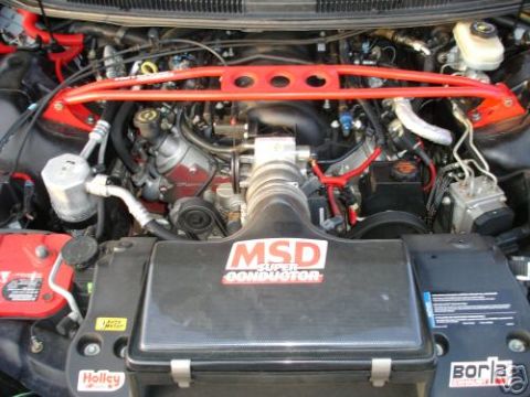 2002 Pontiac Trans Am - The engine bay features a red strut tower brace and an MSD Super Conductor air intake system.
