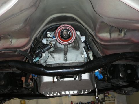 1992 Ford Crown Victoria - Close-up of the vehicle's transmission and driveshaft, showing mechanical components.