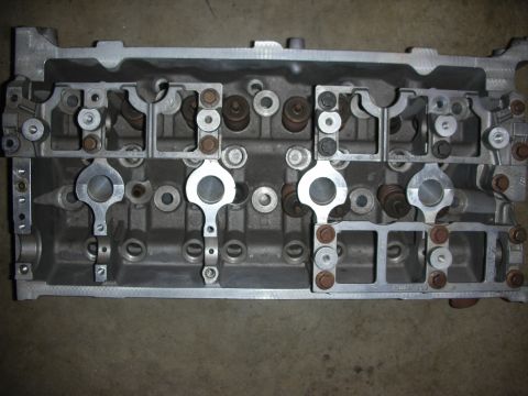 1998 Ford Crown Victoria - This is a close-up view of an engine cylinder head, showing its internal components.