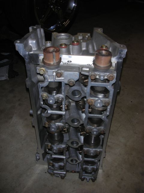 1998 Ford Crown Victoria - Close-up of an engine cylinder head, showing internal components.