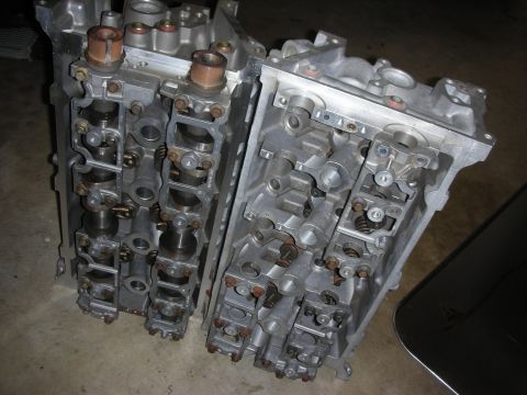 1998 Ford Crown Victoria - Two engine cylinder heads are shown, likely for a V-engine configuration.