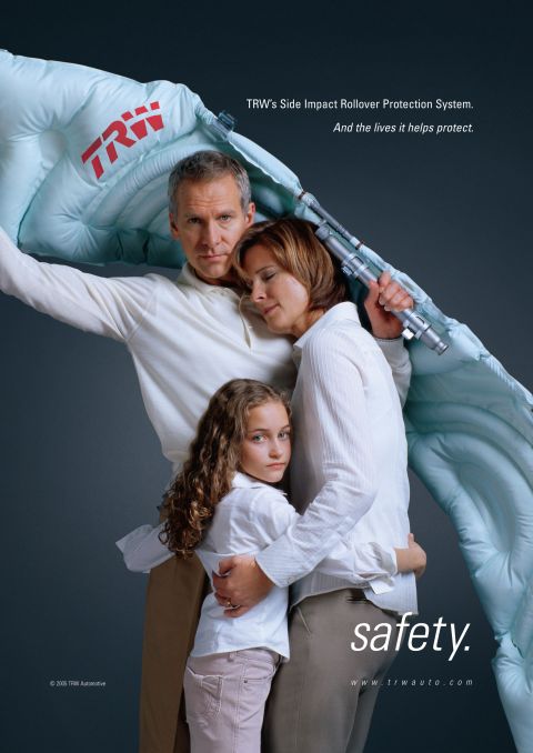 1999 Ford Taurus - TRW's Side Impact Rollover Protection System is advertised with a family, emphasizing safety.