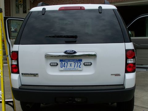 2003 Ford Crown Victoria - This Ford Explorer has emergency lights installed on the rear bumper.