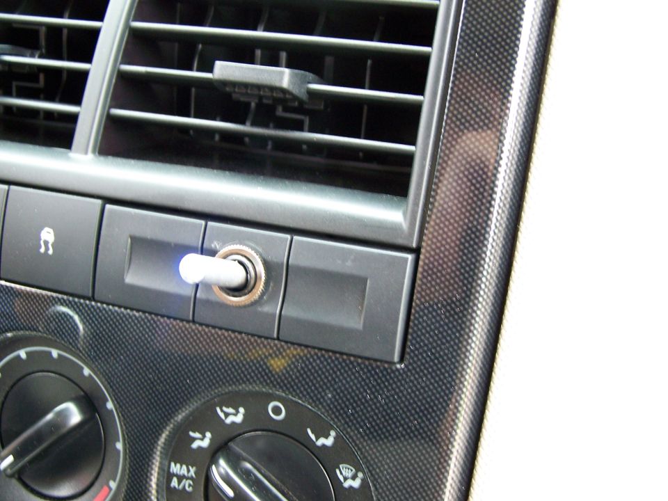 Interior dashboard with toggle switch and climate controls