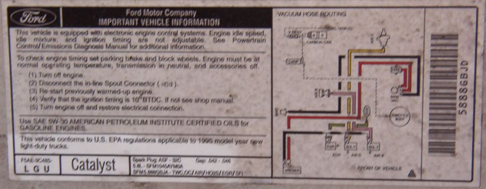 Ford Important Vehicle Information emissions decal with vacuum hose routing