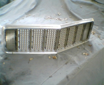 1973 Ford Ranchero - Grille assembly for a 1973 Ford Ranchero, showing its distinctive pattern.