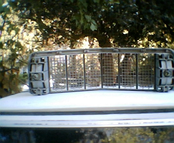 1973 Ford Ranchero - A vehicle grille assembly is shown, likely a replacement part, with a "SUPERMOTORS" watermark at the bottom.