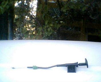 1973 Ford Ranchero - Close-up of a car door handle mechanism, likely an interior part.