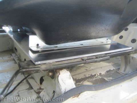 1987 Suzuki Samurai - A custom seat mounting bracket is shown installed on the vehicle floor.