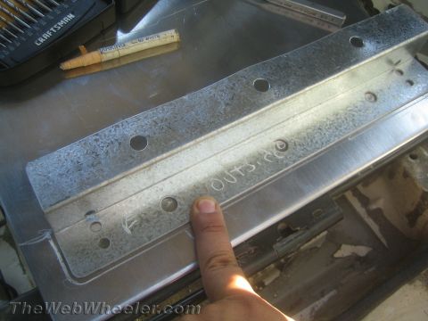 1987 Suzuki Samurai - A metal bracket marked 'OUTSIDE' is shown, likely related to a seat swap modification.