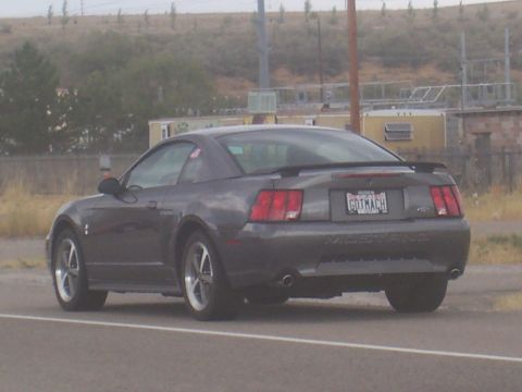 1972 Ford Ranchero - This dark gray coupe has a spoiler and a custom license plate.