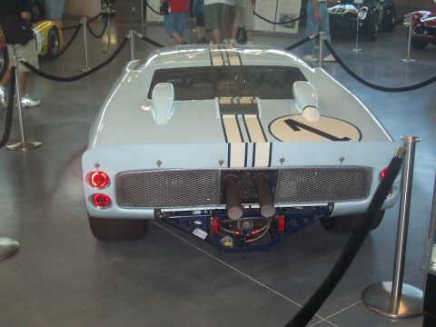 1972 Ford Ranchero - Rear view of a 1967 Ford GT40 race car, showing its distinctive twin exhaust and racing stripes.
