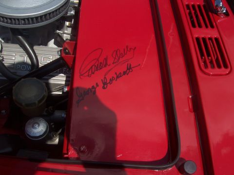 1972 Ford Ranchero - Close-up of a red engine bay showing handwritten signatures on a metal panel.