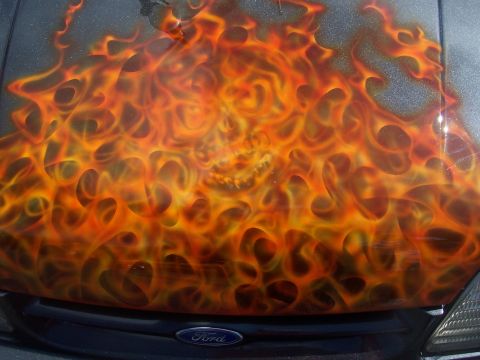 1972 Ford Ranchero - Ford hood airbrushed with flames and a skull design.