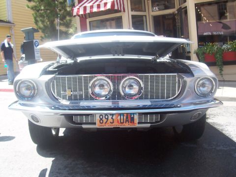 1972 Ford Ranchero - Front view of a 1967 Ford Mustang Shelby GT500, hood open, showing dual headlights.