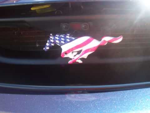 1972 Ford Ranchero - A running horse emblem with an American flag design is visible on the vehicle's grille.