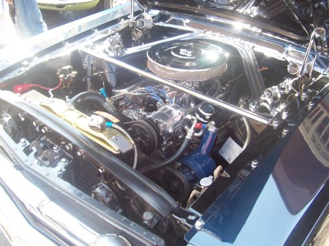 1972 Ford Ranchero - Engine bay of a 1967 Ford Mustang, a V8 engine and polished components.