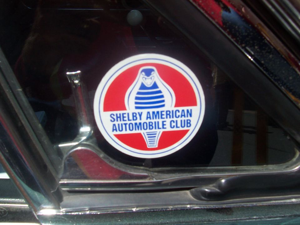 Shelby American Automobile Club sticker on a car window