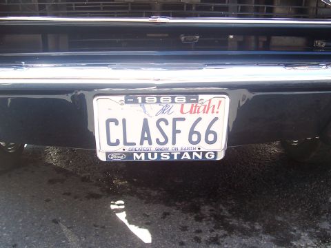 1972 Ford Ranchero - License plate on a Ford Mustang shows "CLASSF 66" and "GREATest SNOW ON EARTH" from Utah.