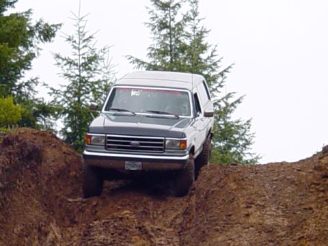 1989 Ford Bronco - This 1989 Ford Bronco is navigating a challenging off-road terrain.