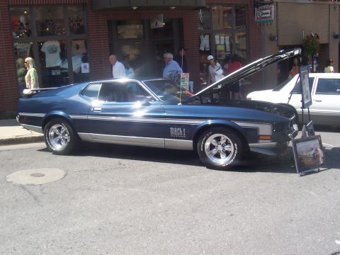 1972 Ford Ranchero - Blue 1971 Ford Mustang Mach 1 on display with hood up.
