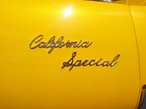 1972 Ford Ranchero - A close-up of the 'California Special' badging on a bright yellow vehicle.