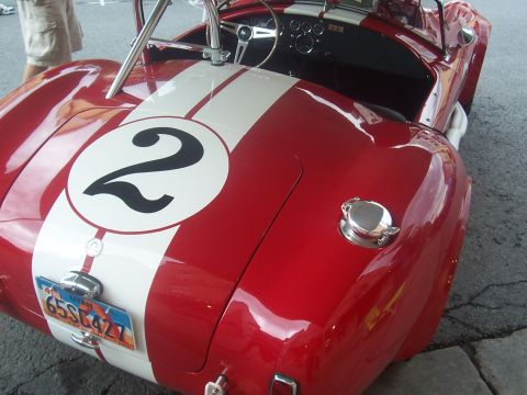 1972 Ford Ranchero - Close-up of a red vintage sports car, racing stripes and the number 2.