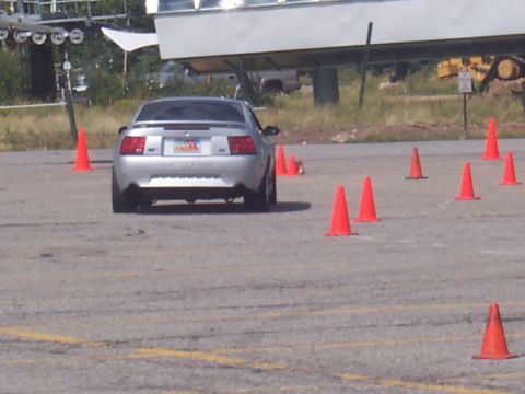 1972 Ford Ranchero - A silver coupe navigates a course marked by orange traffic cones.