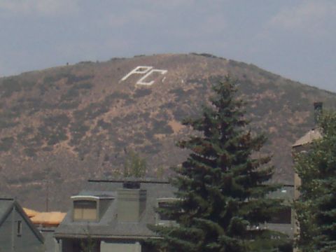 1972 Ford Ranchero - White letters spelling PC are visible on a distant hillside, with houses and trees in the foreground.