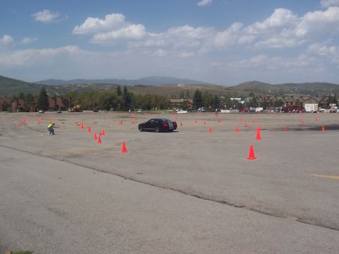 1972 Ford Ranchero - Car driving through an autocross course marked by orange cones.